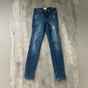 Distressed Dark Blue Denim Jeans